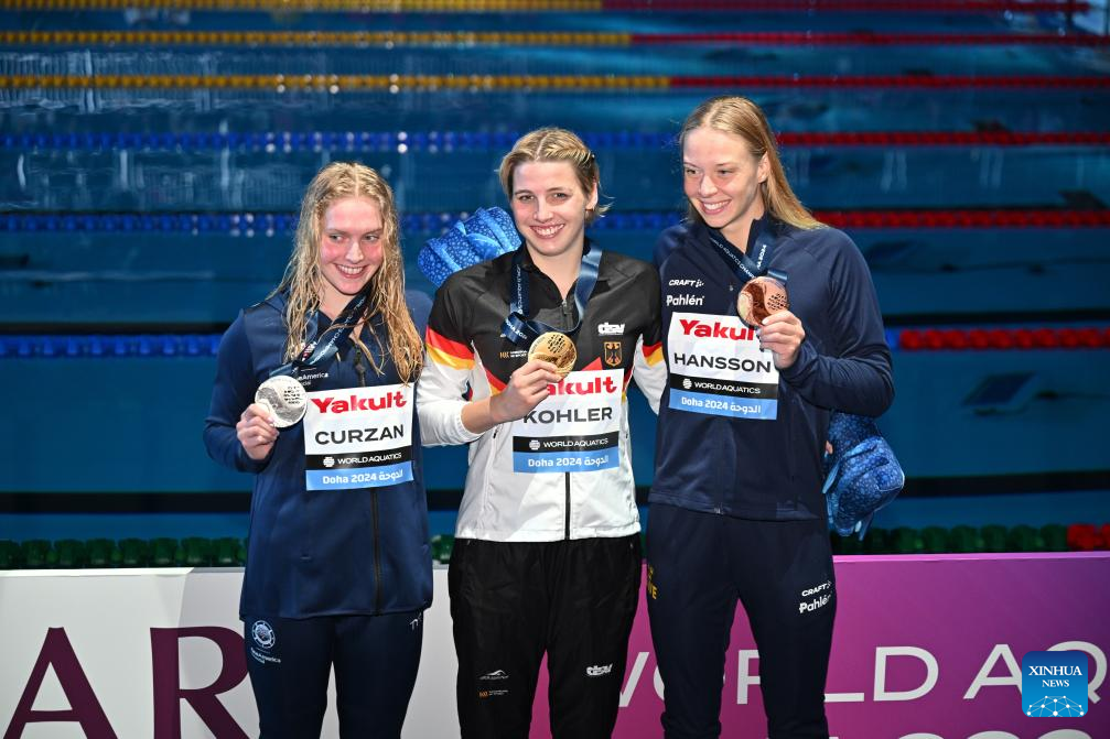 Three new swimming world champions emerge in Doha