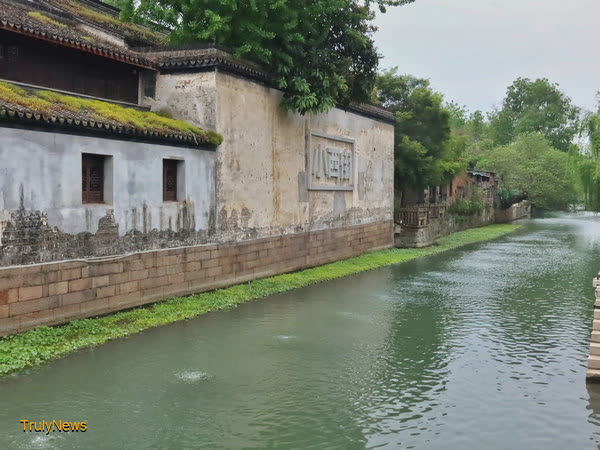 A street offers a glimpse into history and stands as a beacon of modernity