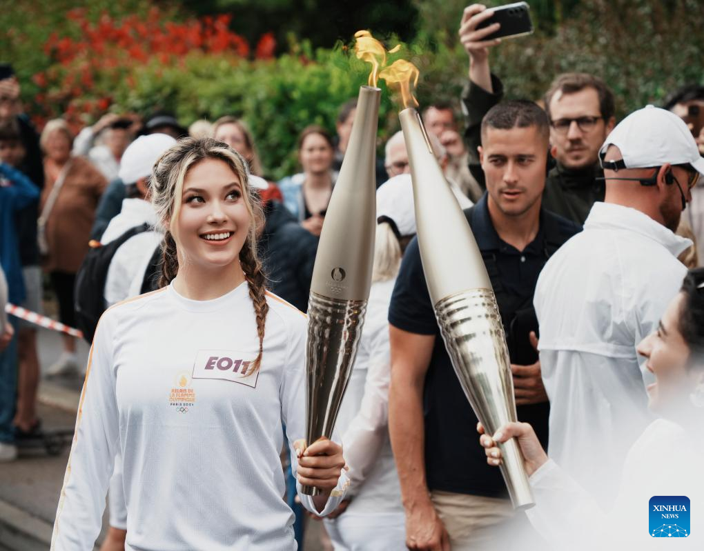 Winter Olympic champion Gu Ailing participates in Paris 2024 torch relay