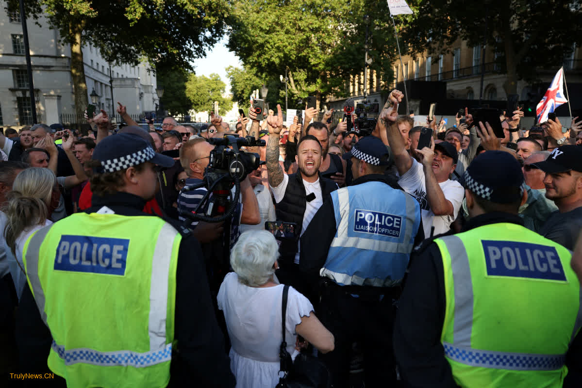 Thousands gather in London after Southport killings spur second night of demonstrations