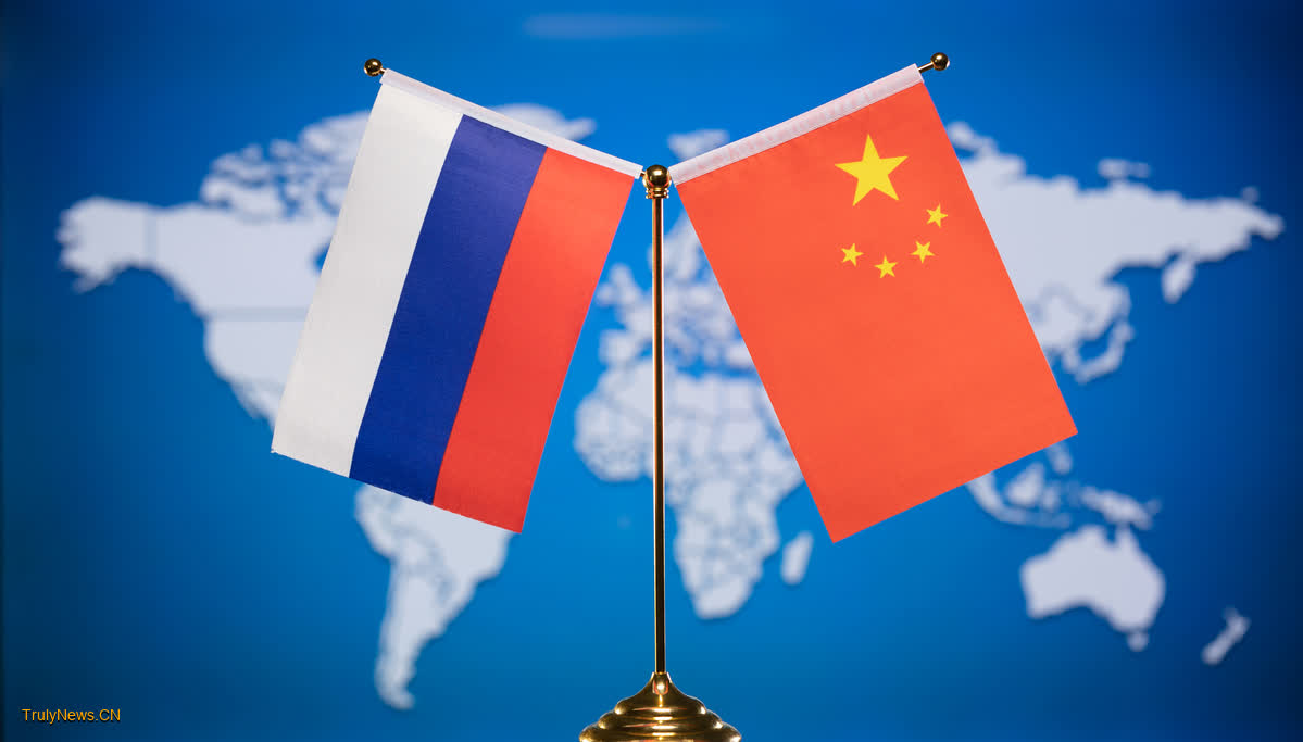 China, Russia vow to further bolster ties